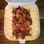 Batata recheada de Bacon Com dois queijos